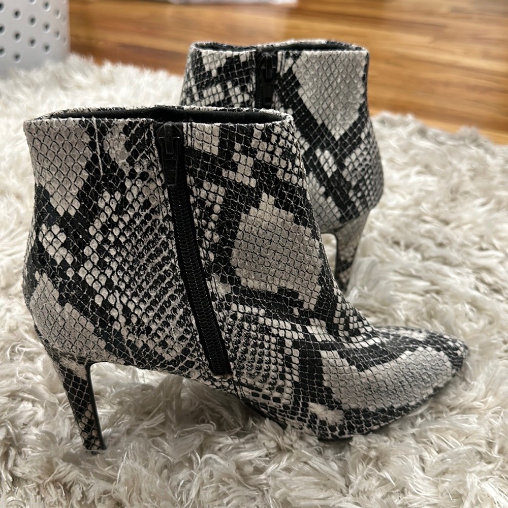 Snake skin boots.